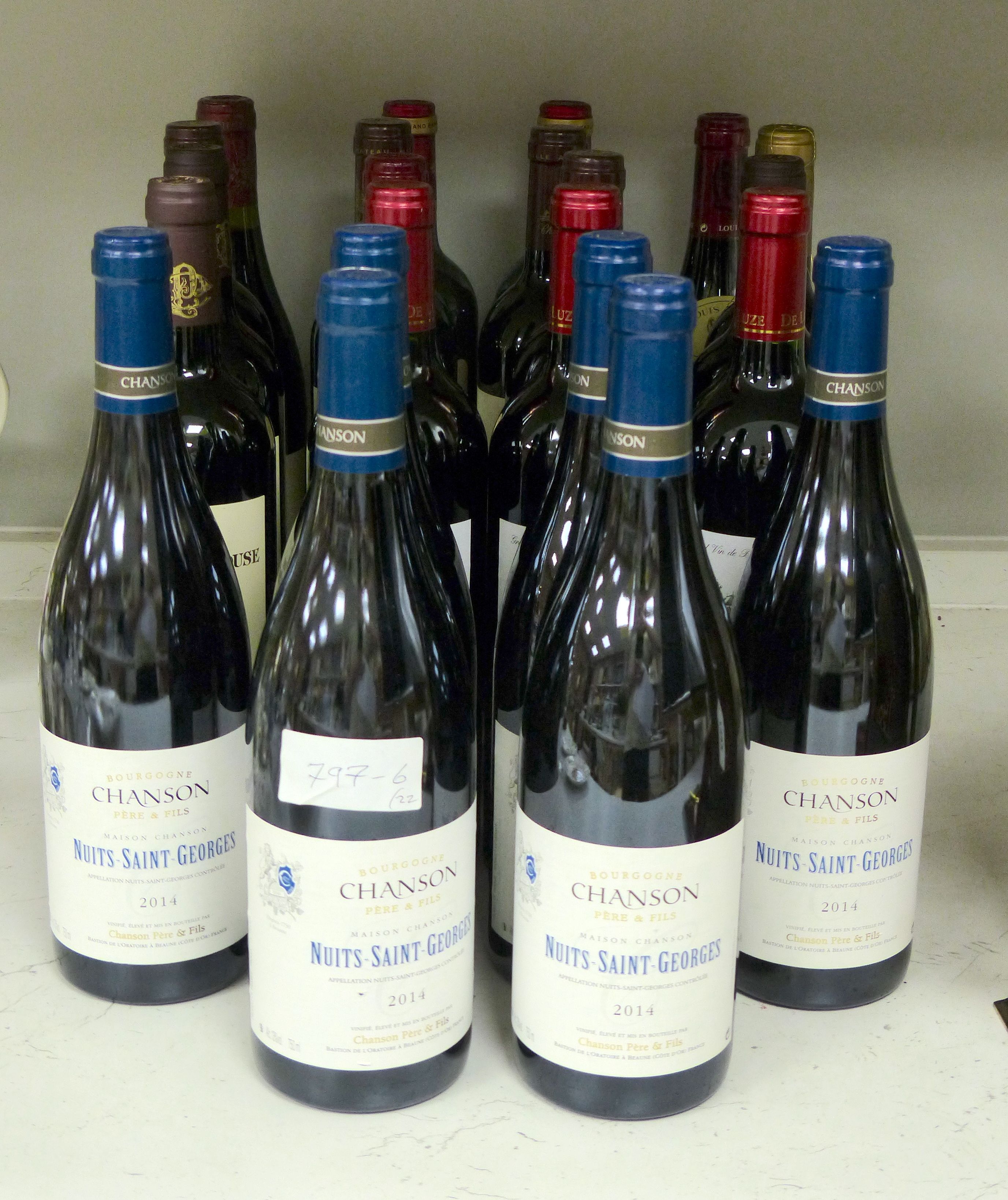 Twenty two assorted bottles of red wine including six Nuit St Georges Chanson Pere & Fils, 2014, two Gevrey Chambertin, Louis Jadot, 2003, three Chateau Gambon La Pelouse, 2013 and four Chateau Barrayres, 2012 (see image